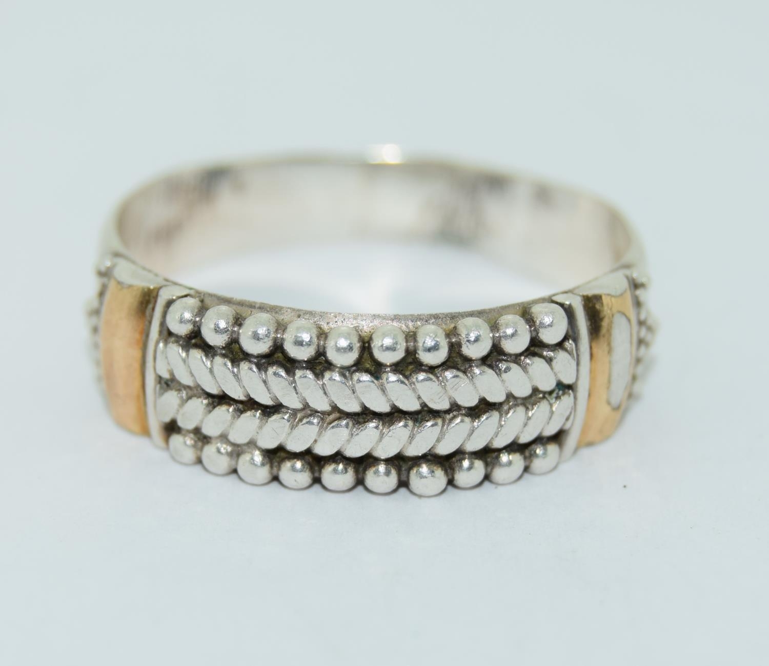 A Designer Suarti 925 silver and 18K ring, Size V