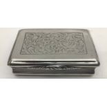 A solid silver Victorian table snuff box by prolific maker Nathaniel Mills, 92.7gms.
