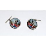 A pair of silver British bulldog cufflinks.