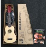 A new Pure Tone ukulele musical instrument.