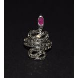 A silver marcasite snake ring with ruby panel for the head