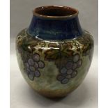 Royal Doulton stoneware vase with grapes and vines decoration. 7" tall