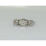 An 18ct white gold fine three stone diamond ring of 2.1cts, approx. Size L