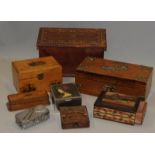 A collection of wooden boxes including a brass bound cigarette box, a Mauchline ware lidded