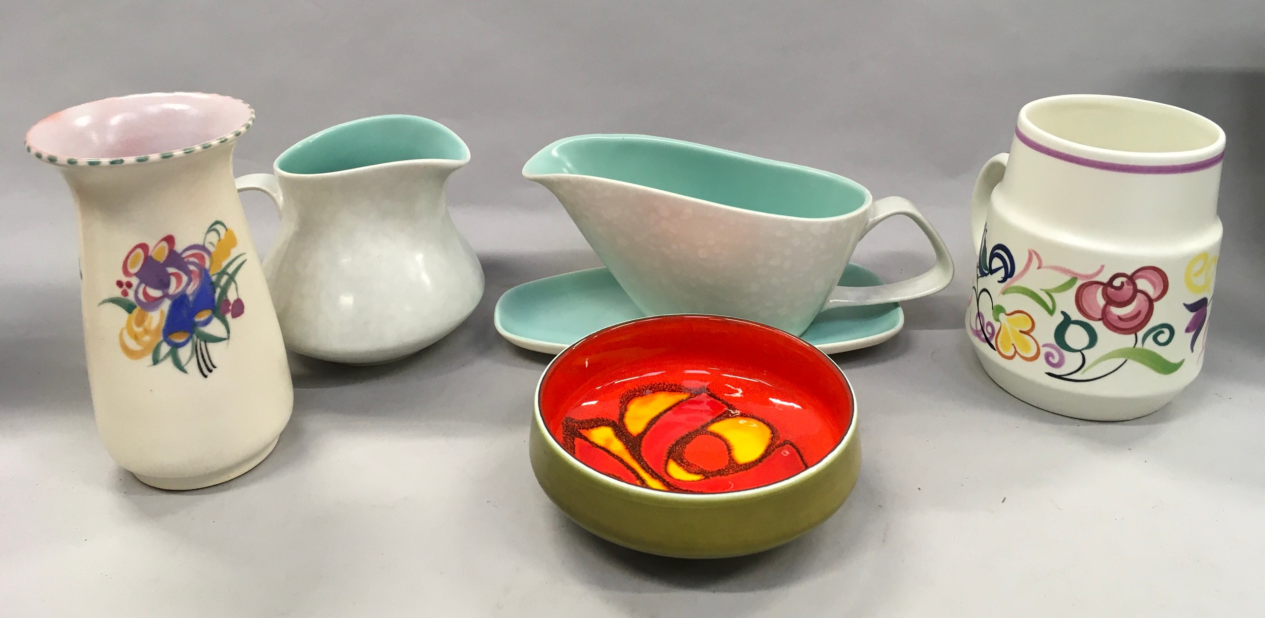 Six items of Poole Pottery to include Twintone and Traditional.