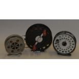 Three vintage centre pin fishing reels to include a Hardy Viscount 140