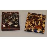 Two vintage tortoiseshell card cases, one with mother of pearl inlay