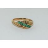 Emerald crossover 9ct gold ring, size Q.