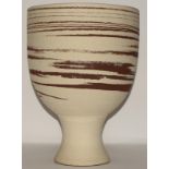 A large egg shaped vase by Alan White (Poole Pottery interest) in a two tone effect of red & white