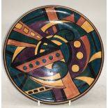Poole Pottery interest 8" abstract design plate by Karen Brown, signed to reverse.