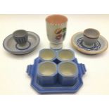 Poole Pottery Carter Stabler Adams unusual egg cup set on tray together with three other eggcups.