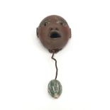 Poole Pottery interest Guy Sydenham hanging mask with cord (possibly a door knocker) overall