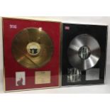 TWO RECORD COMPANY PRESENTATION DISC?s. These were presented to head of Warner Brothers UK Richard
