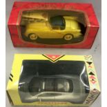Two boxed die cast car models