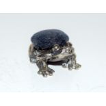 Silver collectable pin cushion of a Toad
