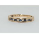9ct gold ladies diamond and sapphire channel set ring size M ref wp 24
