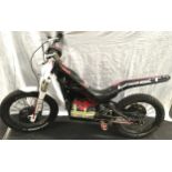 Oset childs electric motocross bike. (58)