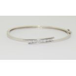 Stylish CZ gemset 925 silver bangle. (TR3)