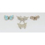 Four silver vintage butterfly brooches. (TR16)