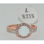 New 18ct rose gold on 925 silver opal halo ring, Size N 1/2. (TR10)