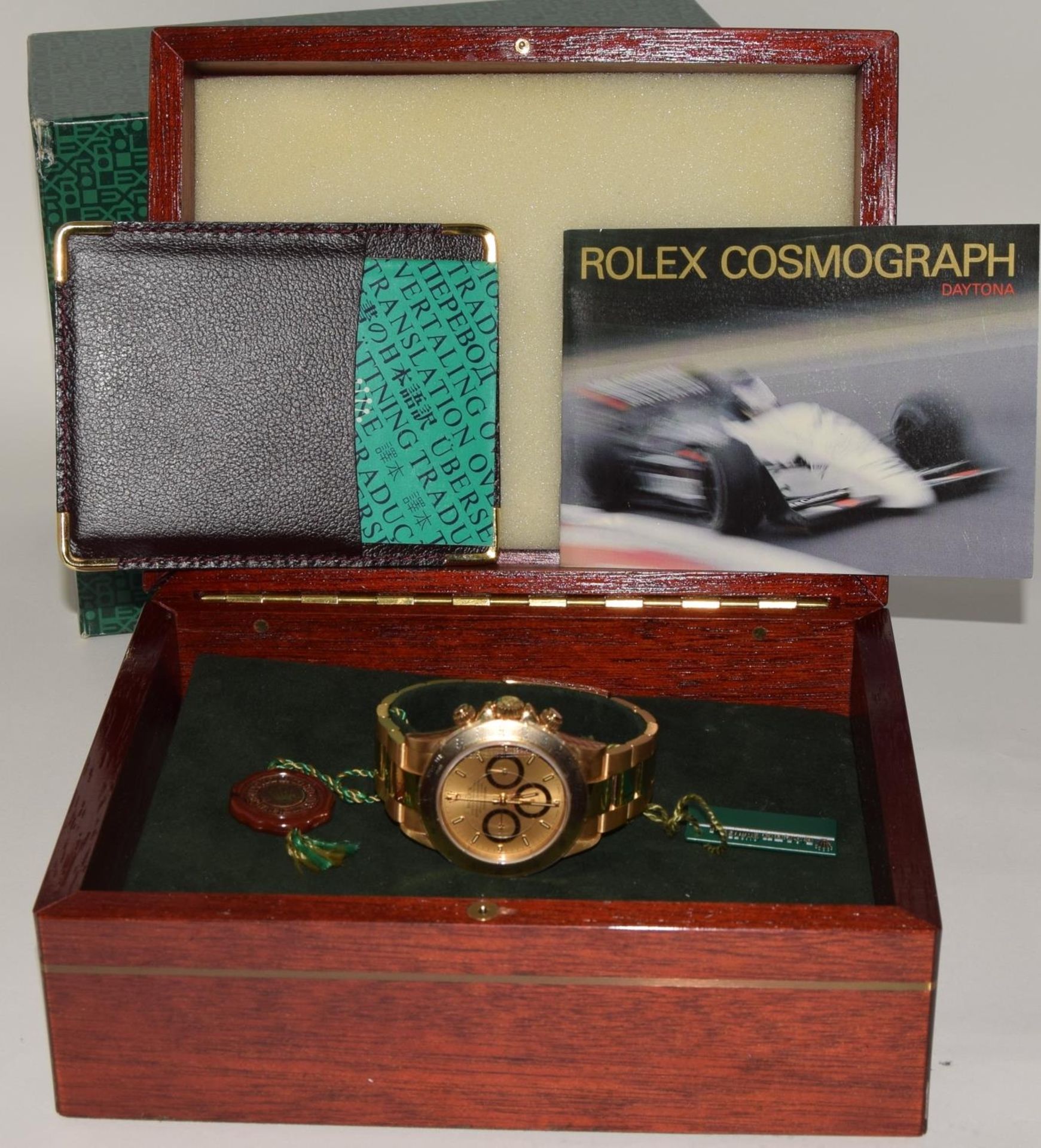 18ct gold Rolex Daytona model 16528, 1991, boxed and papers with service record. (ref 52) - Image 10 of 10