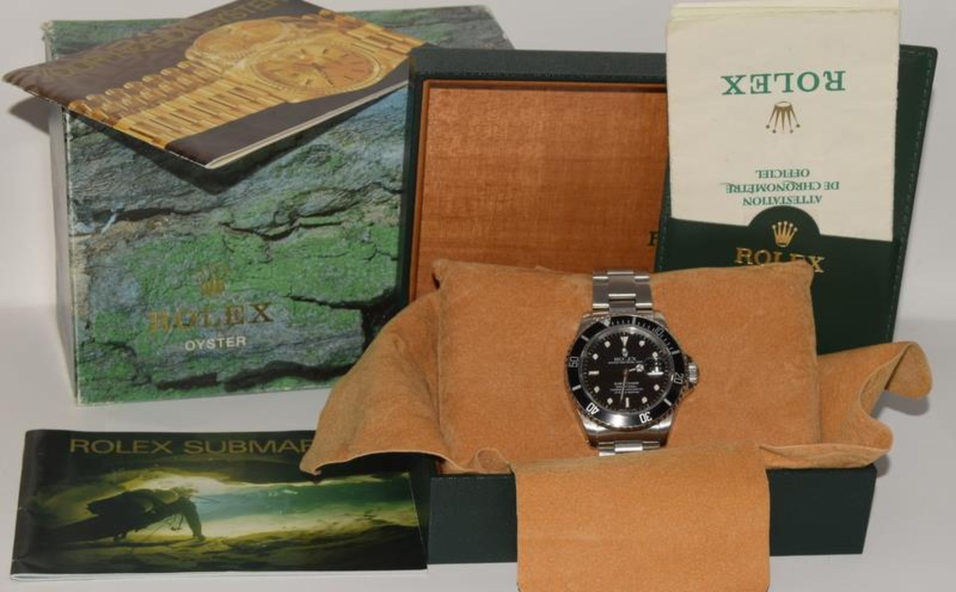 Rolex Submariner model 16610 Nov 1996, running, good condition, comes complete with both box, papers