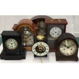 A box of assorted clocks.