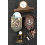 A box of assorted clocks including cuckoo clocks.