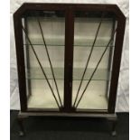 Art Deco glazed display cabinet with two shelves on cabriolet legs 123x88x34cm.