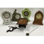 A selection of wooden and ceramic mantle clocks