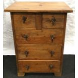 Pine chest of two over three drawers of small proportions 48x66x35cm.
