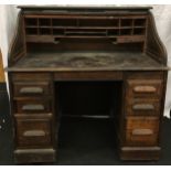 An antique oak roll top desk comprising of five pieces.