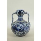A Chinese blue and white porcelain garlic head vase, decorated with a phoenix and lotus flowers, six