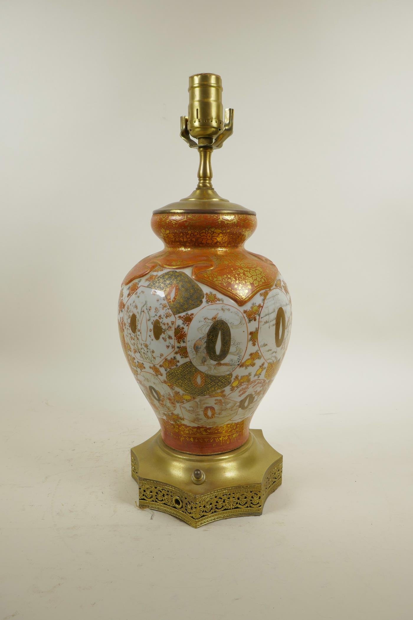 A Japanese Meiji Kutani porcelain vase with brass mounts, converted to a lamp, the body with tanto