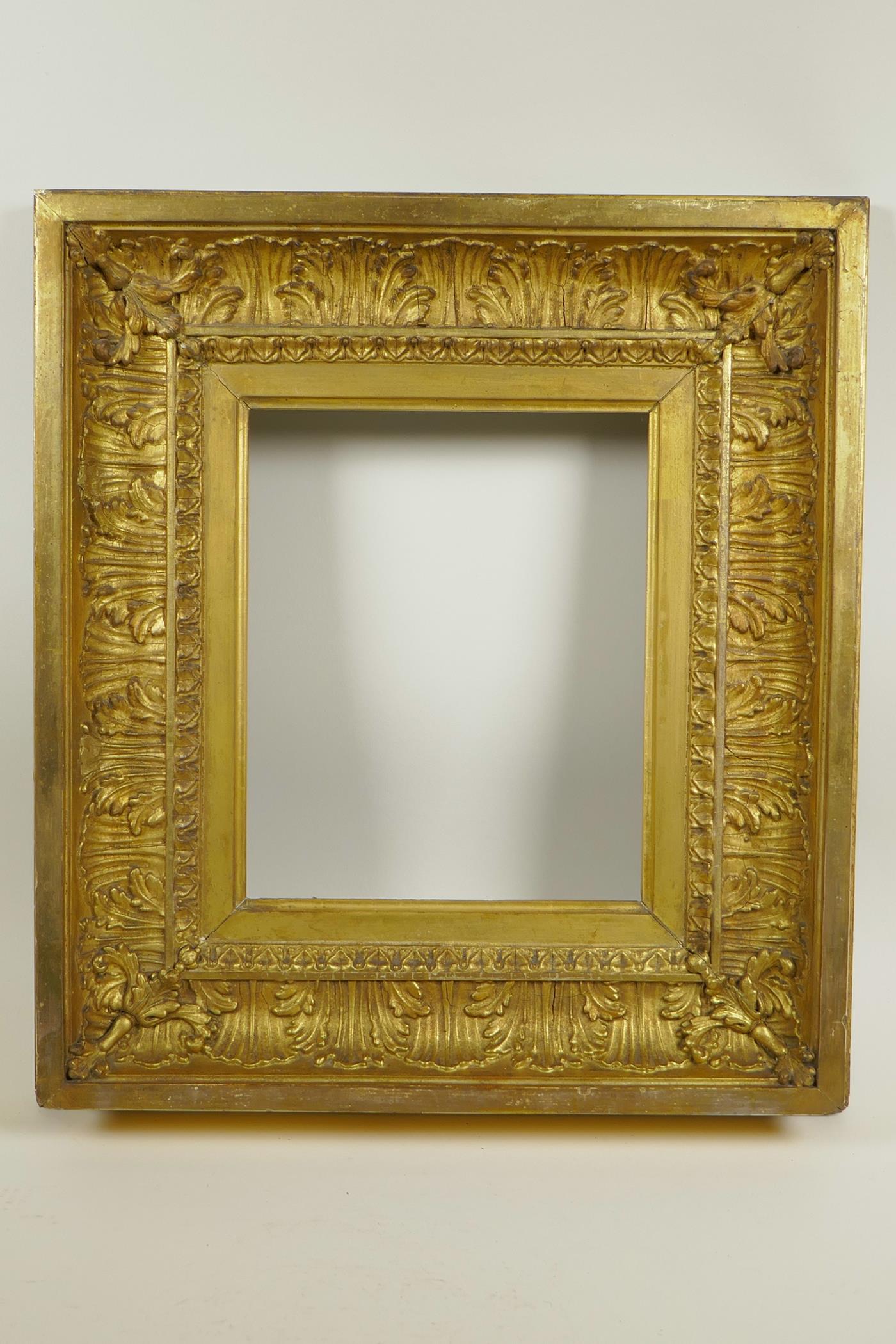 A C19th gilt composition picture frame, with leaf and scroll decoration, rebate 10" x 8¼"