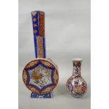 A C19th Chinese Imari vase with floral decoration in blue and red with gilt highlights, 6" high x