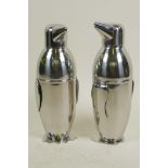 A pair of plated metal cocktail shakers in the form of penguins, 9" high