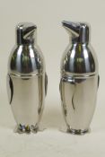 A pair of plated metal cocktail shakers in the form of penguins, 9" high