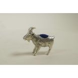 A sterling silver pincushion in the form of a goat, 1" long
