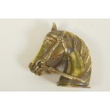 A brass vesta case modelled as a horse's head, 2" high