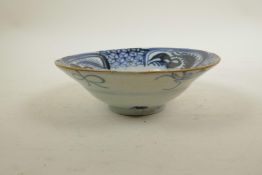 A Chinese blue and white porcelain bowl, signed to base, A/F hairline crack, 6½" diameter