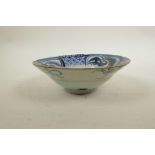 A Chinese blue and white porcelain bowl, signed to base, A/F hairline crack, 6½" diameter