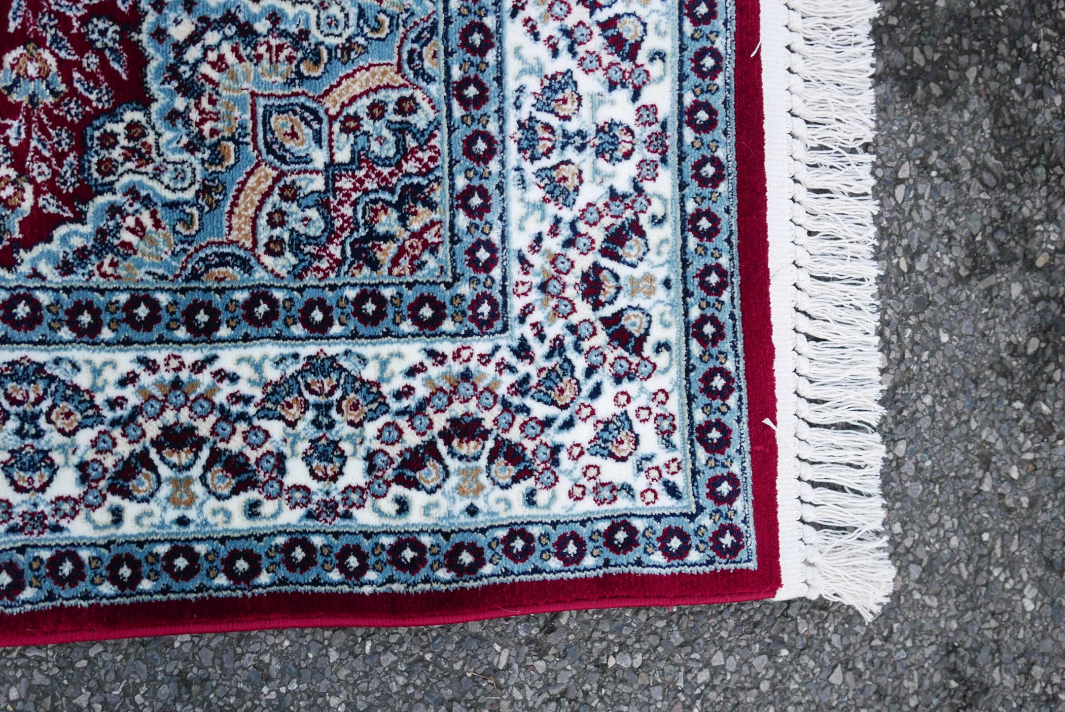 A Turkish red ground deep pile runner decorated with floral medallions on a blue field with cream - Image 4 of 5