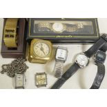 Seven various wristwatches and a small brass cased travel clock