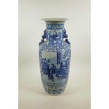 A Chinese blue and white porcelain vase with two fo dog handles, with decorative panels depicting