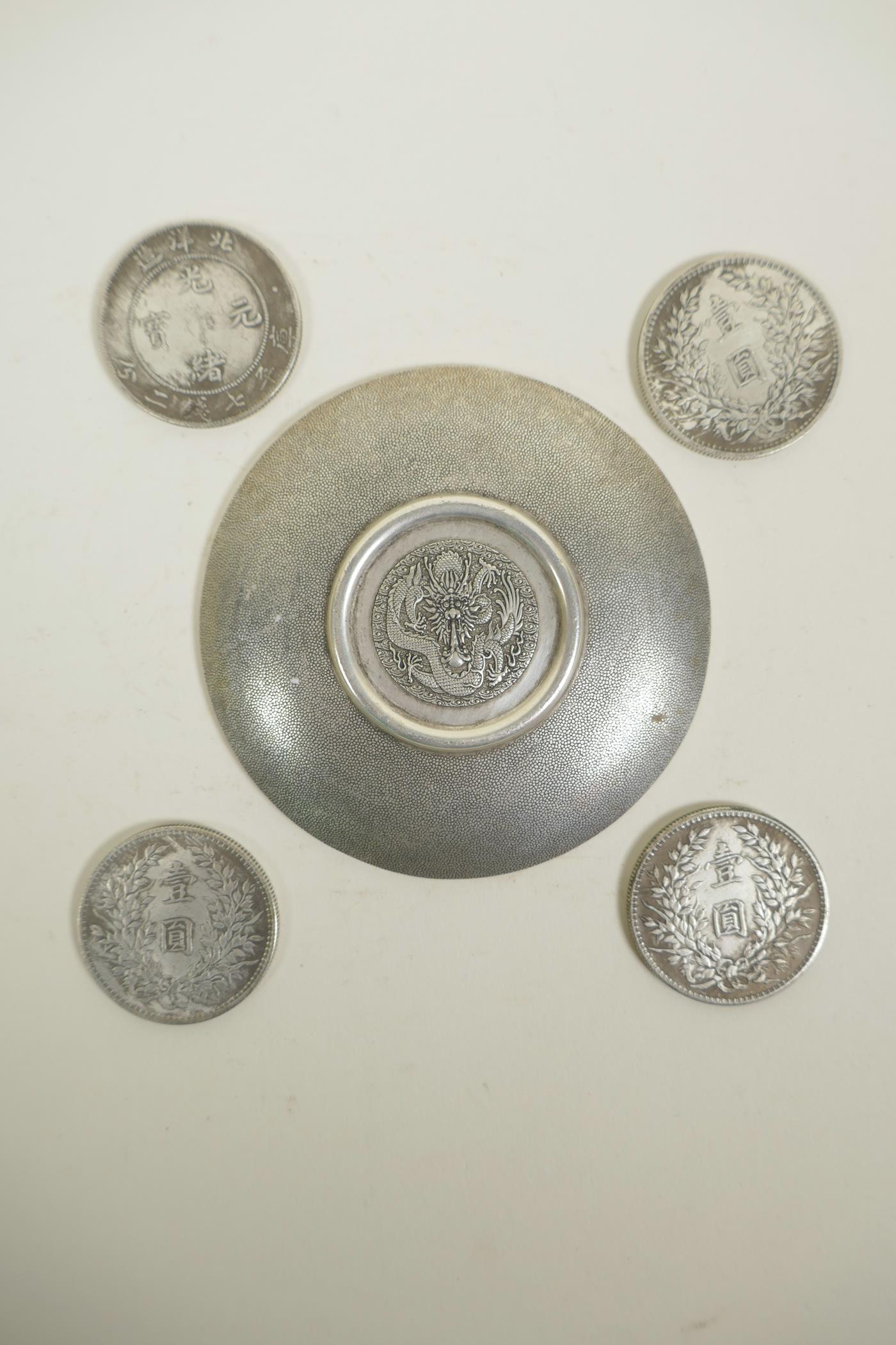 A Chinese white metal coin dish with raised dragon decoration, and four facsimile (replica) - Image 2 of 2