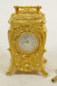 A Rococo style gilt cased miniature carriage clock with key, 3" high