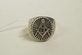 A 925 silver ring with Masonic insignia decoration, approximate size 'T'