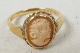 A 9ct gold ring set with shell cameo, size 'L'
