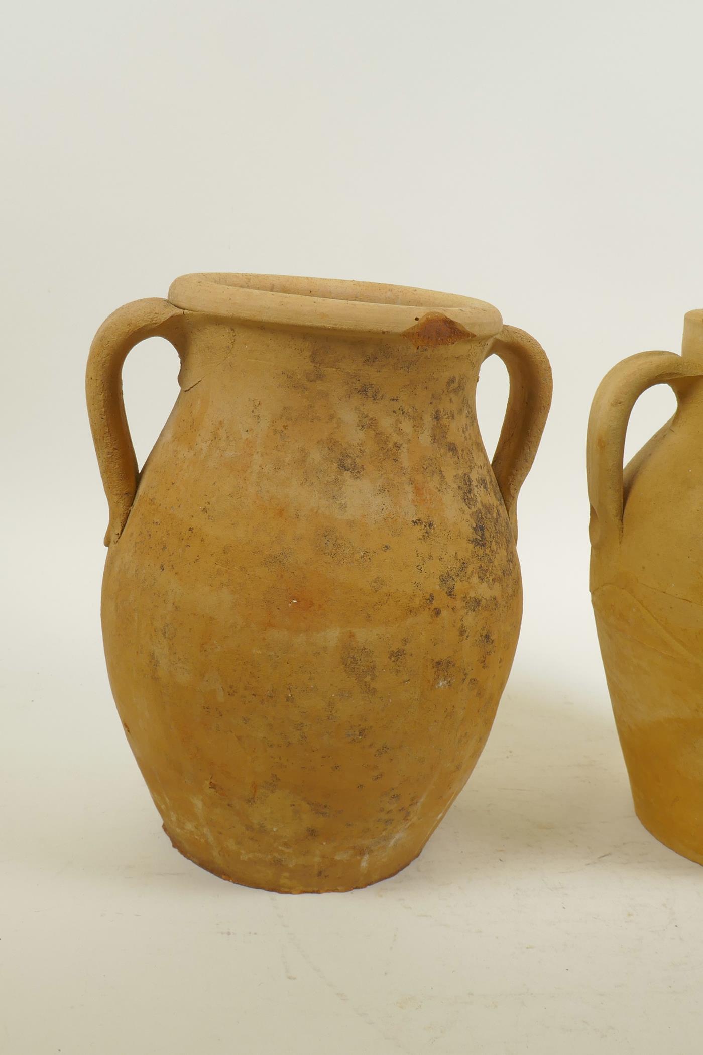 A pair of continental terracotta two handled jars, 8" high - Image 3 of 4